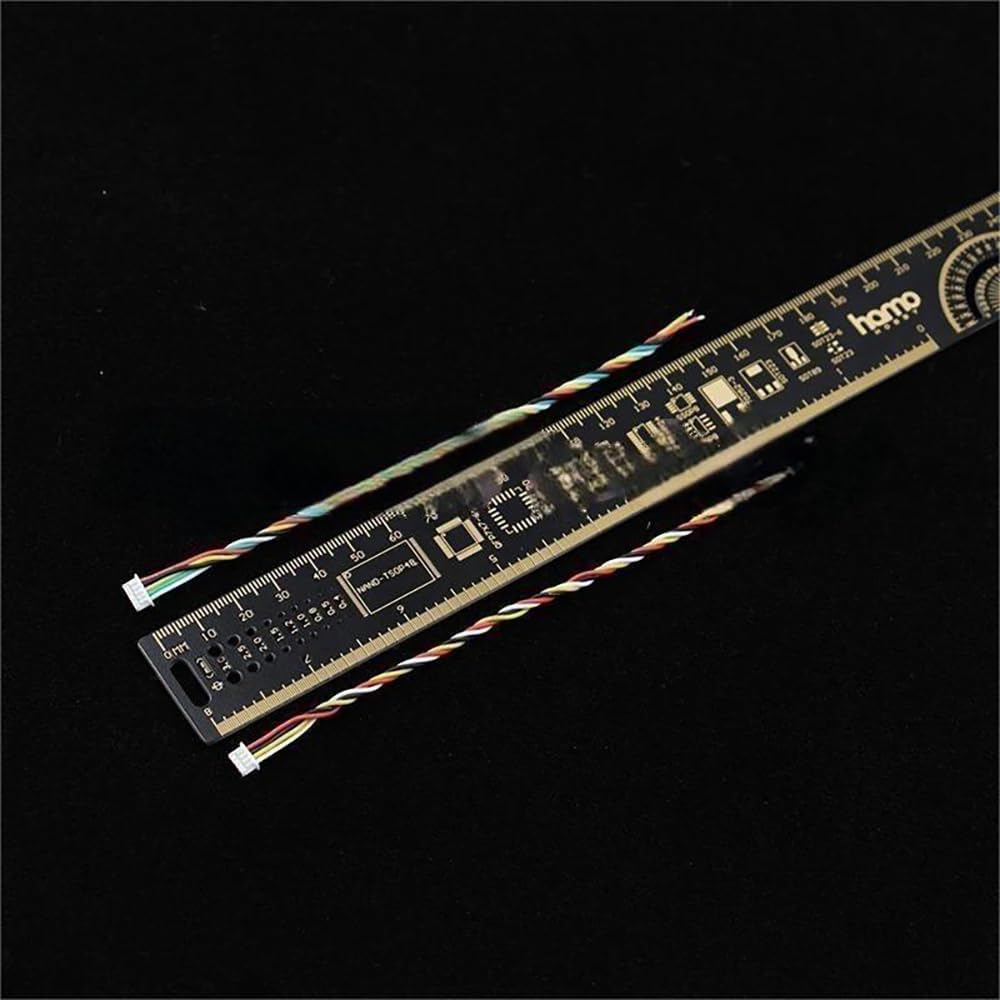 FPV cables laid out next to a ruler for length measurement