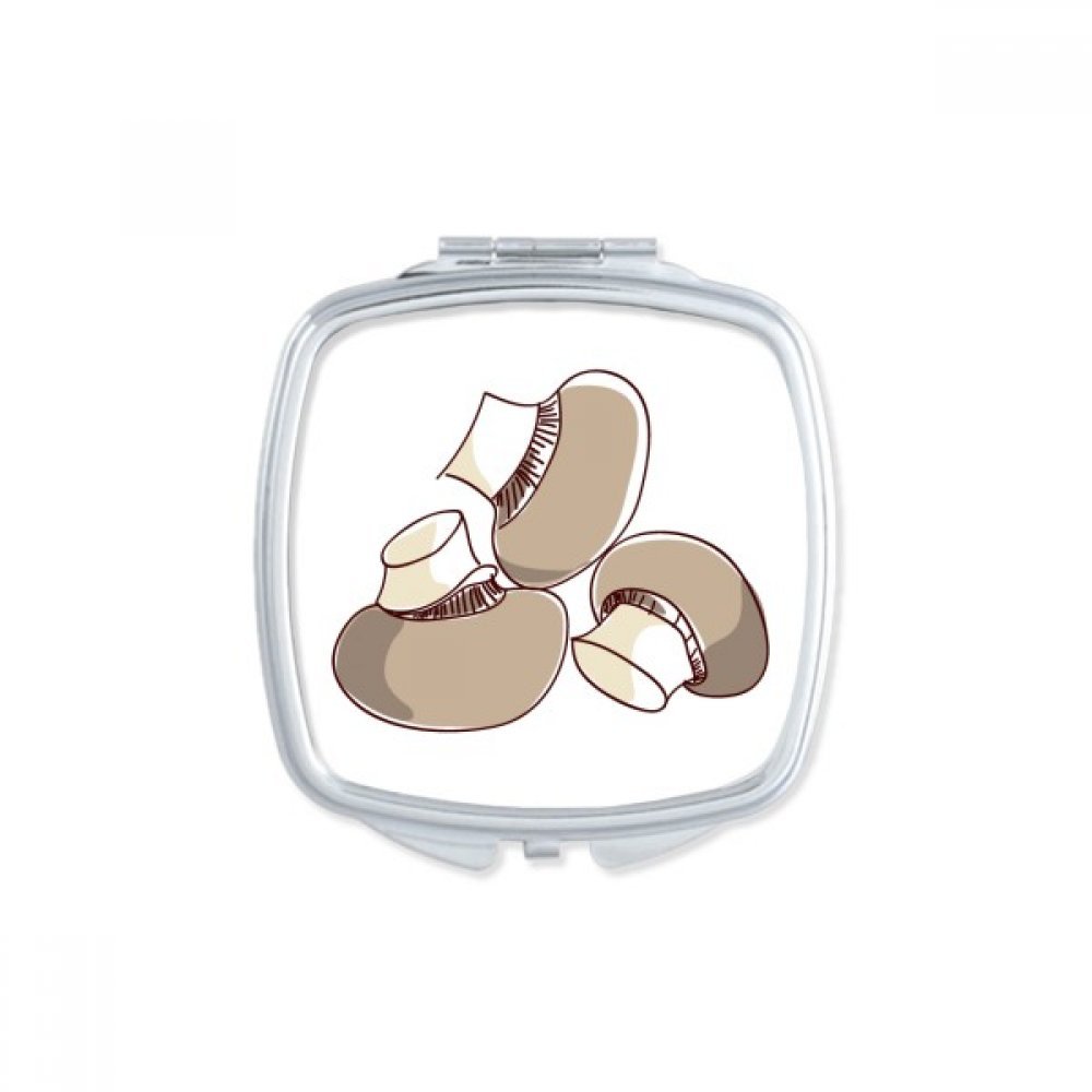 Miroir de poche motif champignon flammuline en métal coloré