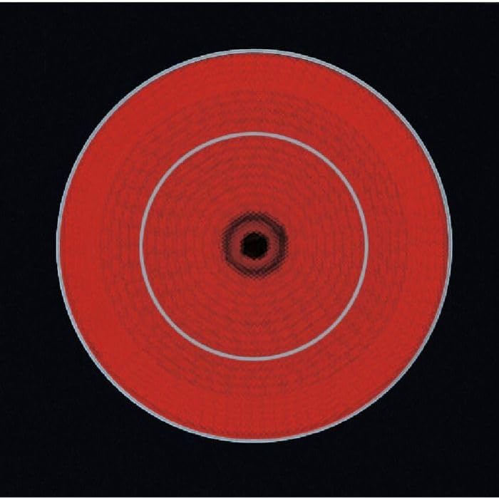 A single radiant ceramic cooking zone glowing red, indicating it is active and hot.