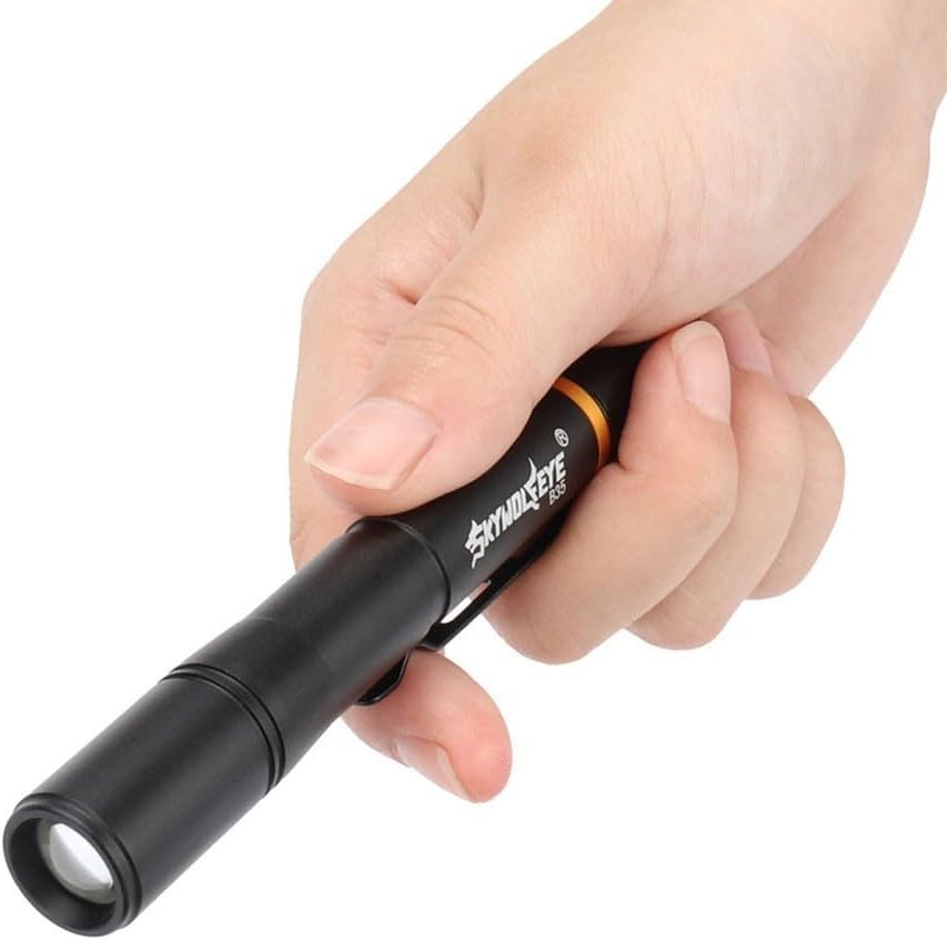 Hand holding the AugustknowU Mini Flashlight, showing the rear cap.