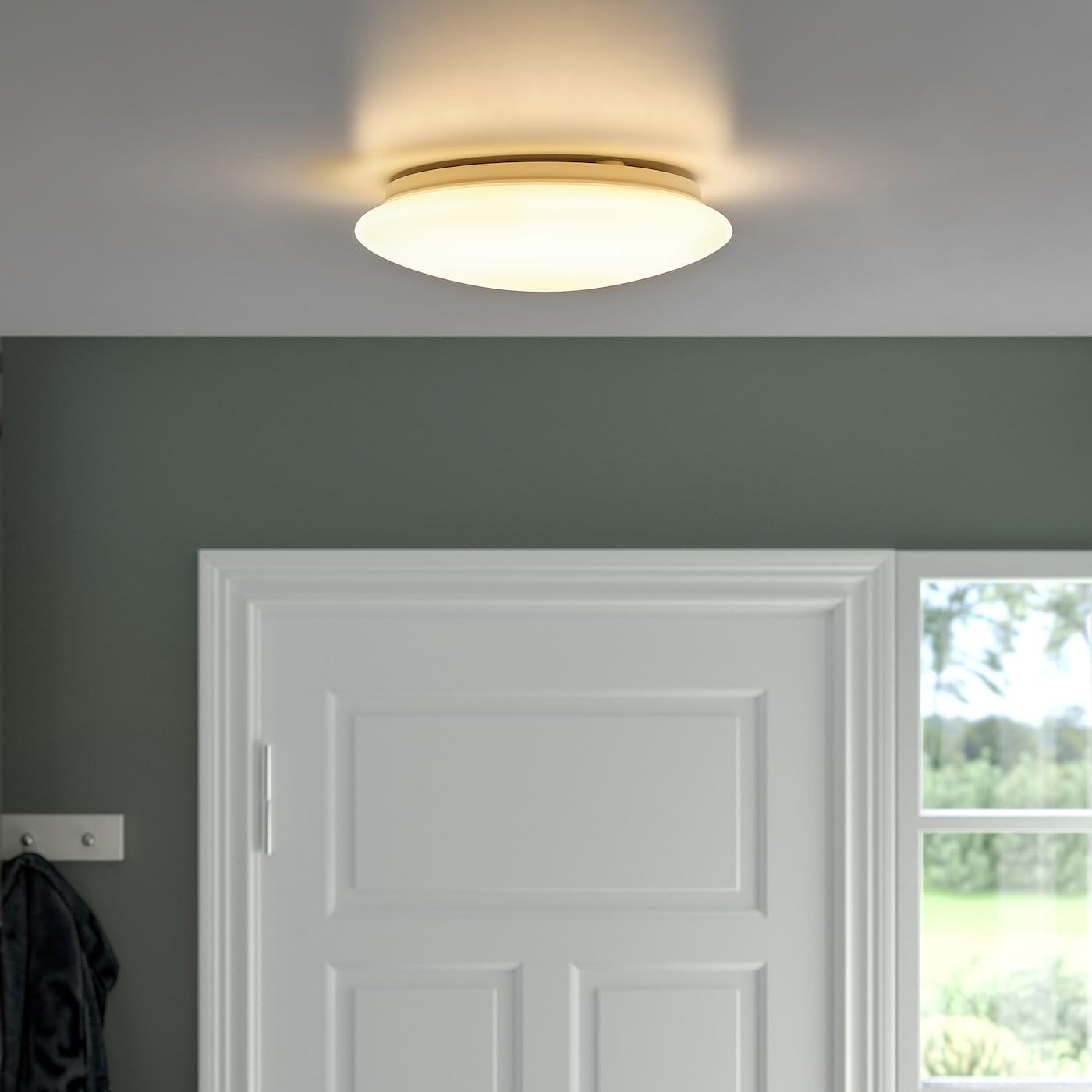 Ikea BARLAST LED lamp installed on a ceiling in a room