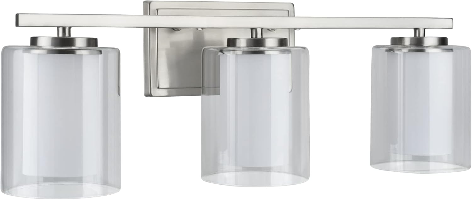 Aspen Creative 62103A, Three-Light Metal Bathroom Vanity Wall Light Fixture, 23" Wide, Transitional Design in Satin Nickel with Clear Glass Shade