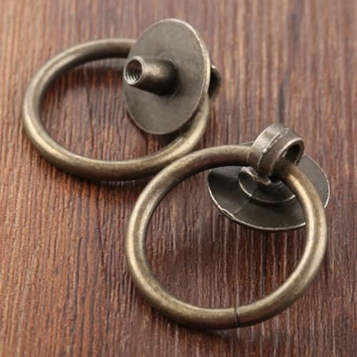 Tiradores vintage para muebles de cocina con aro móvil en tono bronce y diseño retro 4