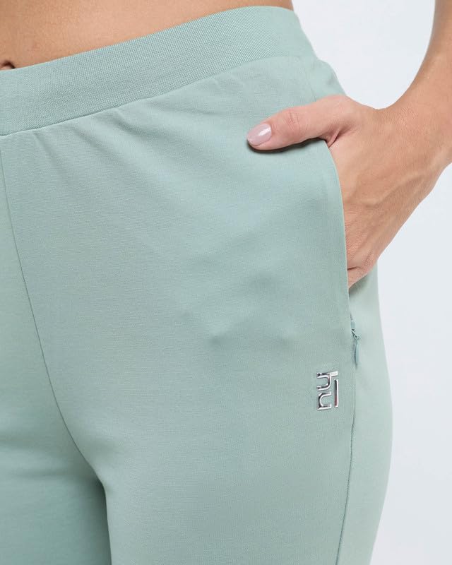 Image of HUNNIT Essential Flare Pants for Women with Zip Pockets | Mid Waist Solid Cotton Tapered Flare Pants | Bootcut Flared Trousers with Wide Elastic Waistband | Relaxed Fit Flared Trouser
