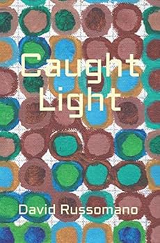 Paperback Caught Light Book