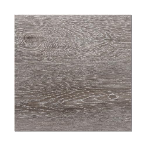 Carreaux de sol autocollants pour masquer un vieux carrelage sans travaux ni poussière
