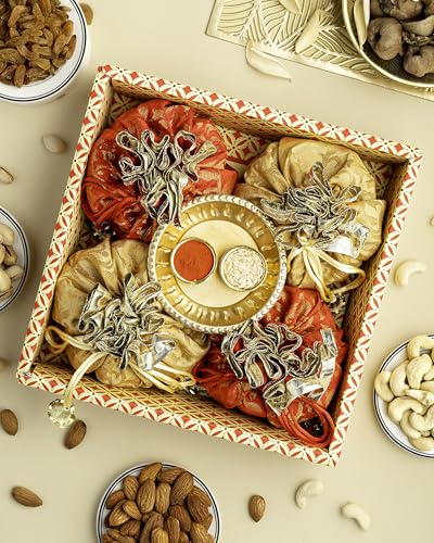 Image of Hyperfoods Rakhi Gift Hamper for Brother Rawfruit's Handcrafted Potli Pack of 4 Almond Cashew Raisins Pistachios 495 Grams with Thali Roli & Rice Dry Fruits Gift Pack Rakhi for Brother with Dry Fruit