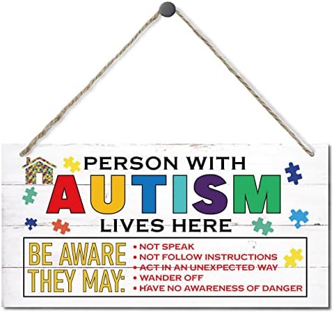 Amazon : Person With Autism Lives Here Sign, Hanging Wood Sign Home