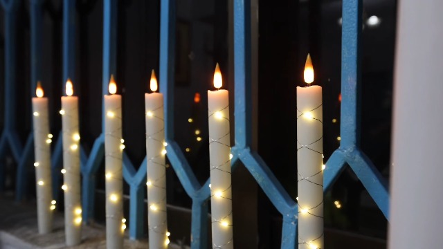 Image of Da by 3 Pack Ivory Heat Resistant Flameless Taper Candles, Cross Surrounding Fairy String Lights, Realistic Dynamic Flame LED Candles with Remote Control for Indoor Outdoor Decor