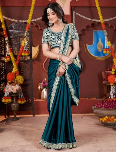 Image of DHARMEE Women's Elegant Designer Sarees Premium Rangoli Fabric with Embellished Border, Lightweight and Stylish Ethnic Wear - Perfect for Parties, Weddings, and Festive Occasions..