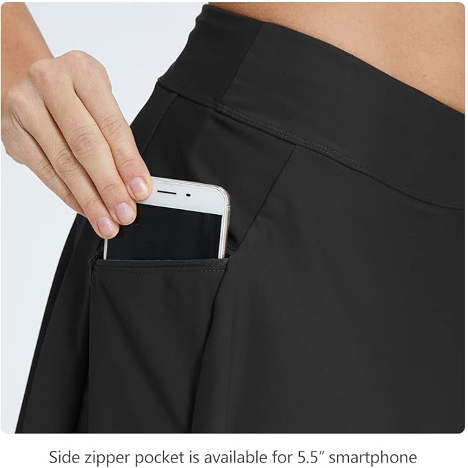 The BALEAF Women's High Waisted Swim Skirt is a stylish and functional option for women looking for a flattering swim bottom. It features a high waist design that provides coverage and support, making it a great choice for those who want a little extra confidence while lounging by the pool or hitting the beach. The skirt also has a side pocket, perfect for storing small essentials like keys, cards, or cash while on the go.