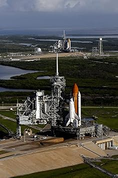 Space Shuttle Atlantis and Endeavour sit on their launch pads at Kennedy Space Center Poster Print by Stocktrek Images 22 x 34