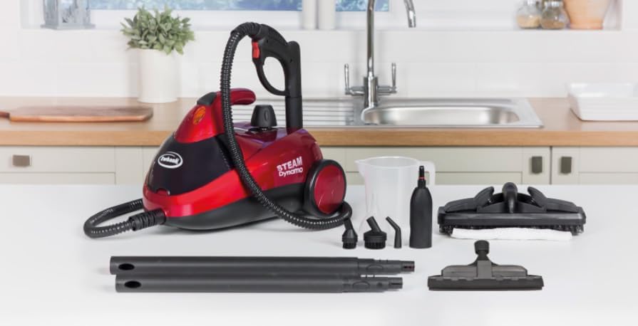 Detailed view of Ewbank Dynamo Steam Cleaner accessories including brushes, floor tools, and extension tubes