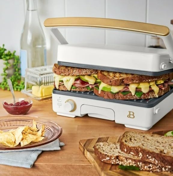 Beautiful By Drew Barrymore Panini Press & Grill with a large sandwich inside