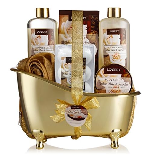 Mother's Day Home Spa Gift Basket, 13 Piece Bath & Body Set For Men & Women, White Rose & Jasmine Fragrance with Shower Gel, Bubble Bath, Body Scrub, Salts, 6 Bath Bombs, Pouf, Cosmetic Bag & Gold Tub