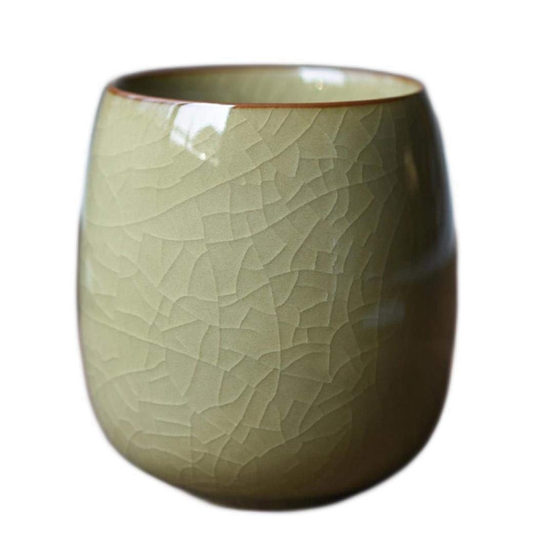 Tasse à thé en céramique avec petite tasse de café en porcelaine