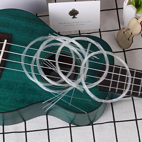 MOLZINY 2 Sets Nylon-Ukulele Saiten mit 4 Saiten pro Set, für Konzert/Sopran/Tenor-Ukulele, leicht, mit Zelluloid-Plektren