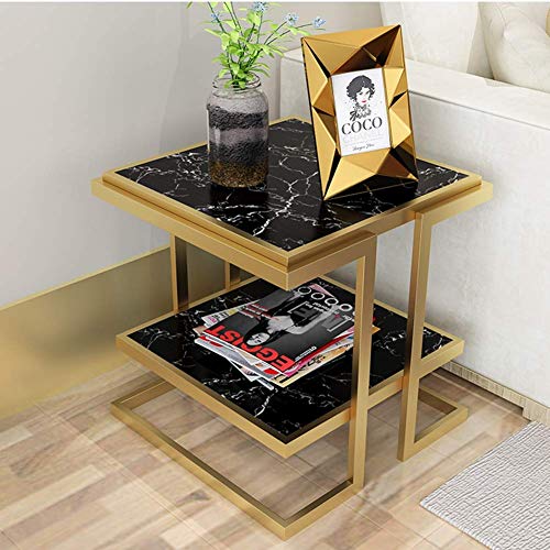 Table basse multifonction noire pour optimiser les petits salons encombrés