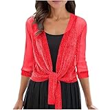 Ce haut de fête femme se marie aussi bien avec un jean pour un look cocktail qu'avec une jupe pour une tenue de soiree femme plus formelle. Sa coupe chic et ses paillettes vous offriront une confiance absolue. Un vêtement femme chic et élégant qui vous mettra en valeur à chaque occasion.