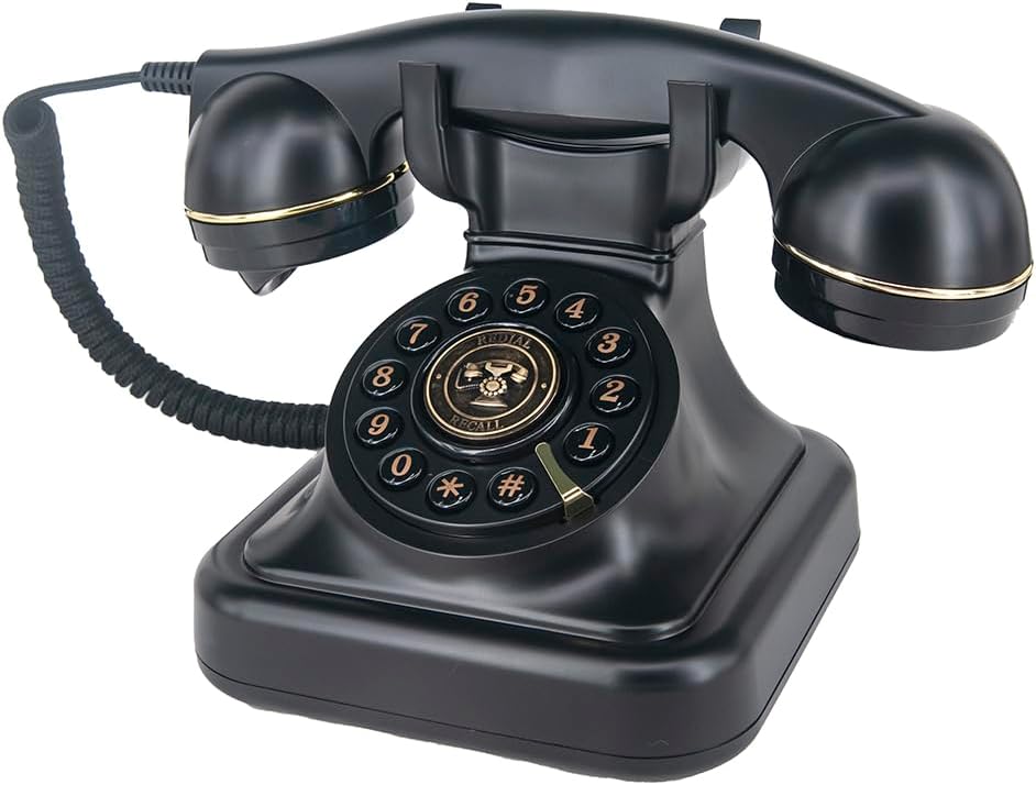 Vintage Phone, a Black Vintage Telephone with Button Dialing, Used for Home and Office Desk. Vintage Phone, a Black Vintage Telephone with Button Dialing, Used for Home and Office Desk.