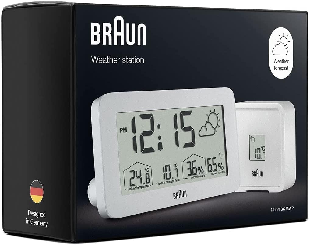 Braun BC13WP Weather Station Clock shown with a ruler for scale, indicating its dimensions.