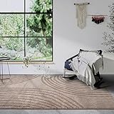 Les poils longs denses et doux au design moderne invite vraiment à se blottir. Les contrastes de couleurs discrets permettent au tapis shaggy de se fondre avec presque tous les styles d'intérieur.