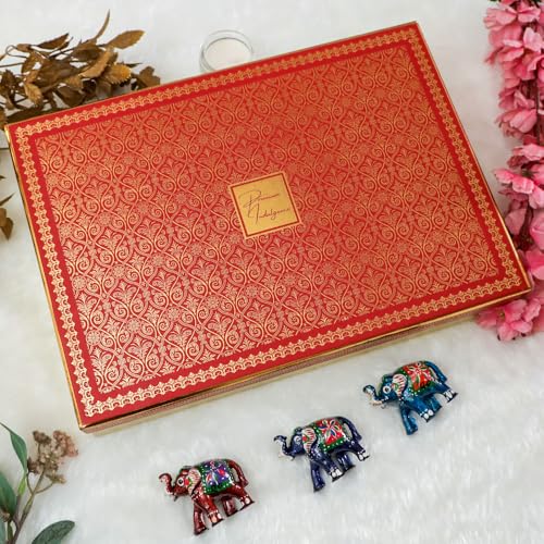 Image of NUTRISNACKSBOX Rakhi Gift Hamper Red for Brother & Bhabhi | 14 Items Premium Gift Box | Dry Fruits, Cookies, Chocolates, 2 Rakhis & Lumba