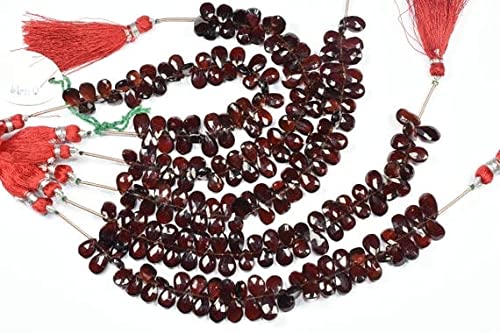 Grenat rouge du Mozambique perles poires facettées pour créer des bijoux chargés d'histoire