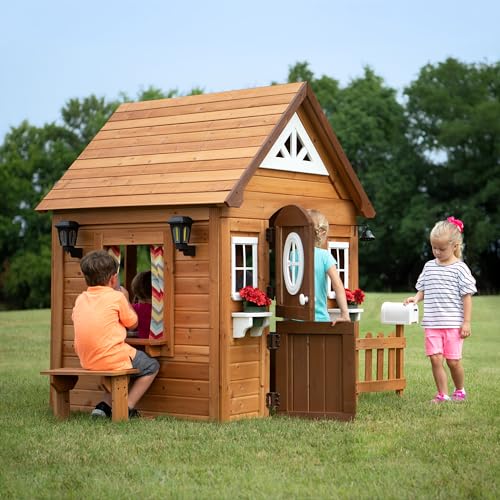 Image of Backyard Discovery Aspen Cedar Wooden Kids Playhouse Cottage with Play Kitchen, Snack Bar, Picnic Bench, Dinner Bell, Mailbox, Dutch Door, Flowerpot Holders, Toy Lights, Country Style for Outdoor Play