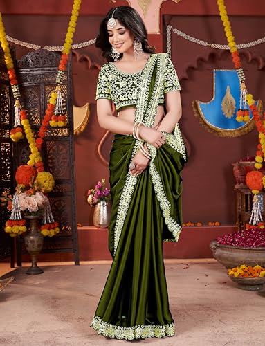 Image of DHARMEE Women's Elegant Designer Sarees Premium Rangoli Fabric with Embellished Border, Lightweight and Stylish Ethnic Wear - Perfect for Parties, Weddings, and Festive Occasions..