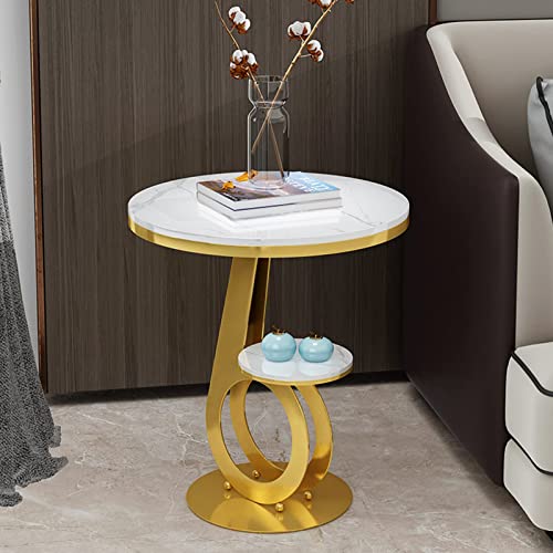 Table basse ronde dorée en métal au design moderne de salon