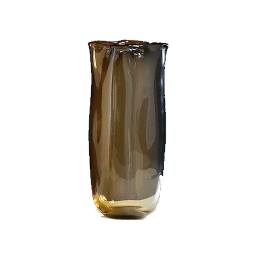 Vase en verre clair pour sublimer un meuble vide avec luxe discret