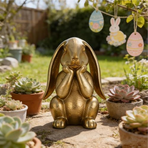 Lapin doré de Pâques en position pensée pour décoration de table