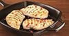 Lodge Square Cast Iron Grill Pan - Pre-Seasoned Square Skillet - Ridged Burger Grill Pan - Even Heat Distribution - PFAS-Free Non-Toxic Cookware - 10.5 Inches #1