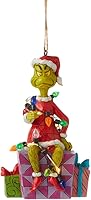 Vista 1 de Enesco Dr. Seuss Grinch por Jim Shore Santa Grinch - Figura colgante y luces LED, adornos coleccionables para árbol de Navidad hechos a mano