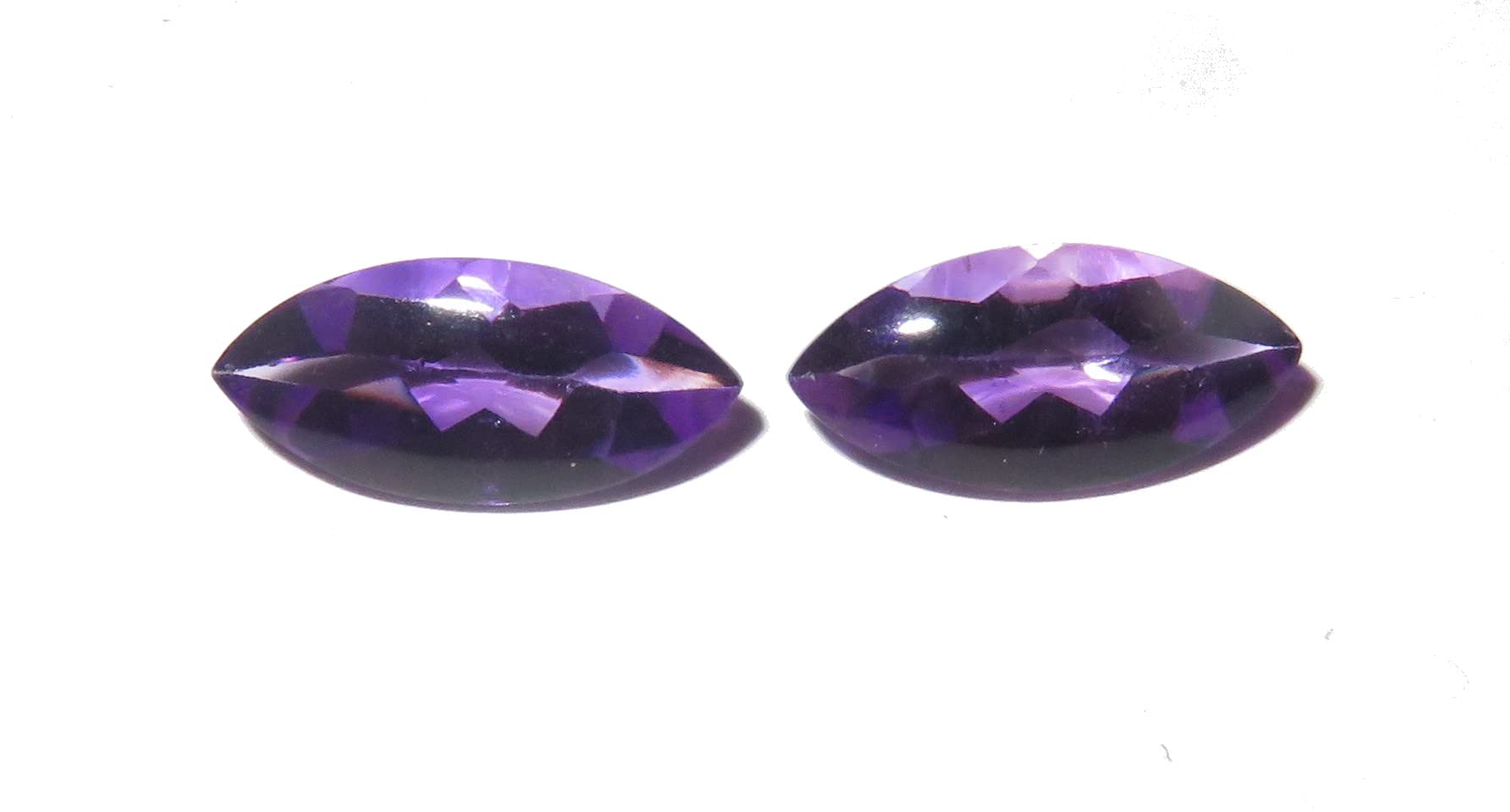 Améthystes marquise 6 carats d'exception : duo de pierres taillées pour joaillerie de luxe