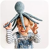 Un peluche agradable para niños. Disuade las pesadillas con sus tentáculos, garantizando comodidad y sensación de seguridad.