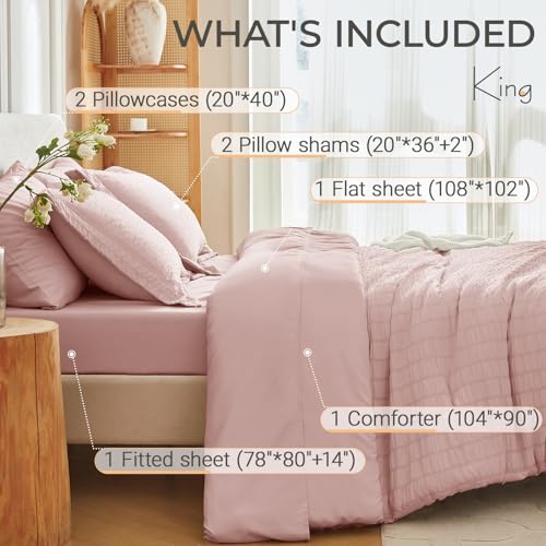 Image of MUXHOMO 7 Pieces King Comforter Set, Seersucker Bed in a Bag King Size, All Season Luxury Bedding Set with Comforter, Flat Sheet, Fitted Sheet, Pillowcases & Shams, Rose Gold