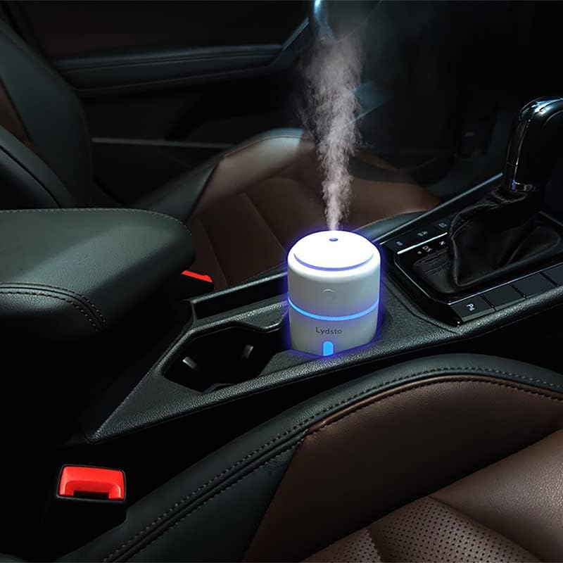 Lydsto Humidifier H1 placed in a car cup holder, demonstrating its portability and use in vehicles.