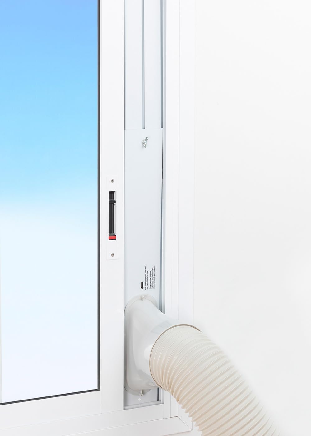 Window sealing kit installed in a window with the exhaust hose connected.