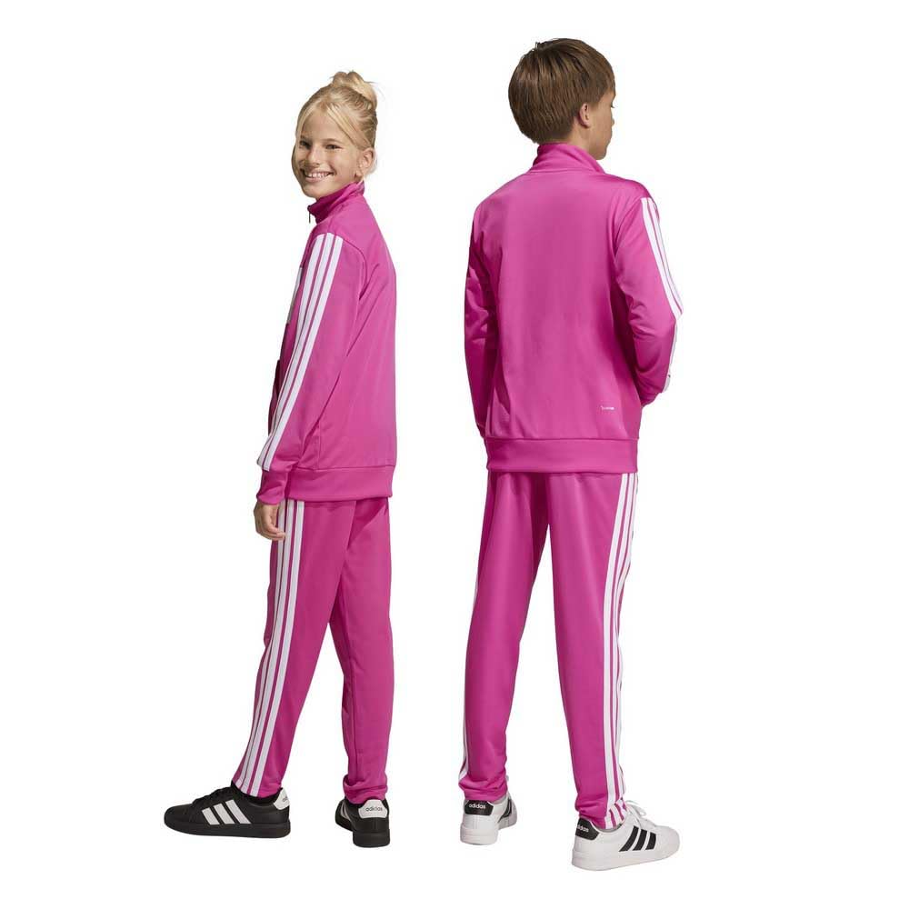 adidas Unisex Kinder SEASONAL ESSENTIALS TIBERIO 3 STRIPES TRICOT TRACKSUIT, semi lucid fuchsia/bright yellow, 13-14 Years