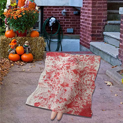 Faux cadavres effrayants dans les sacs pour décorer le jardin