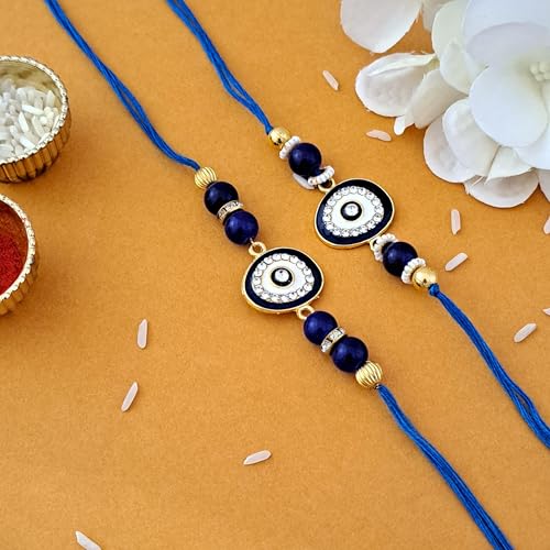 Image of Riddhika Ventures Elegant Evil Eye Rakhi for Protection from Negative Energy (Set Of 2) With Roli Chawal And Greeting Card (J6S)
