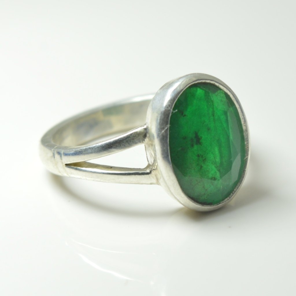 55Carat Unisex NA plata de ley talla ovalada verde esmeralda