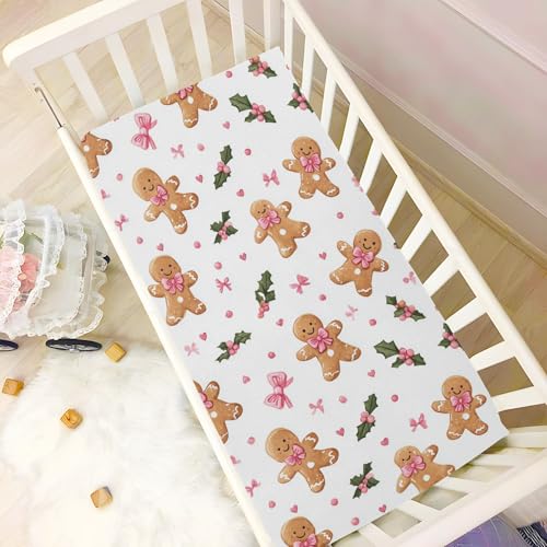 Image of Caikeny Fitted Crib Sheet for Boys Girls Gingerbread Man Pattern with Pink Bows and Holly Leaves Baby Crib Sheets Bassinet Sheets Crib Mattress Bed Sheets for Toddler Newborn Infant 52 X 28 in