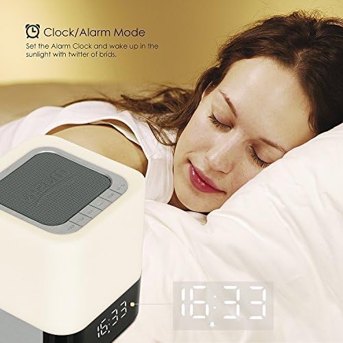 MUSKY DY 28 Plus speaker functioning as an alarm clock next to a sleeping person