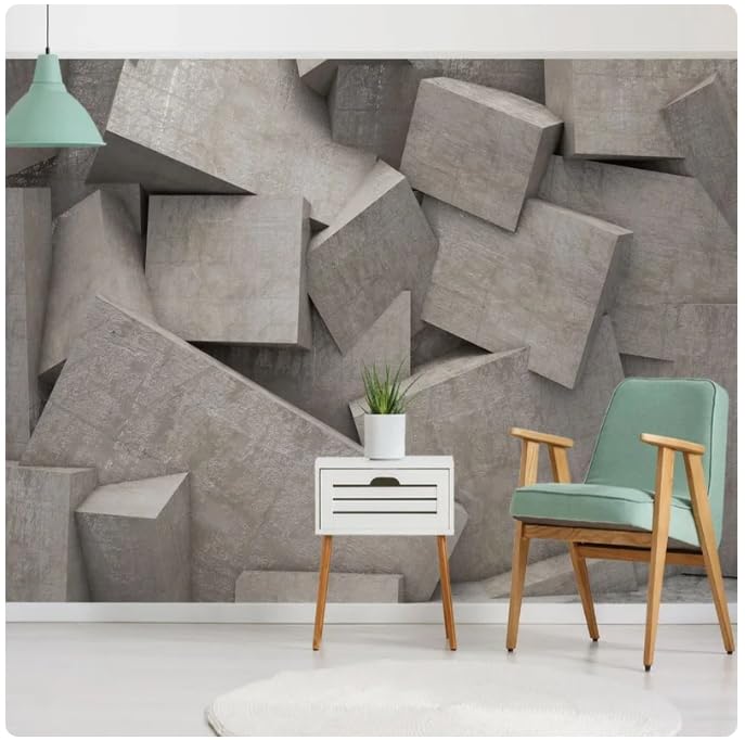 Papier peint intissé panoramique pour agrandir un salon avec un effet cube ciment 3D