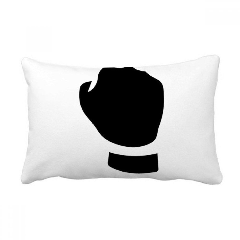 Coussin lombaire poing silhouette contre le mal de dos sur canapé salon