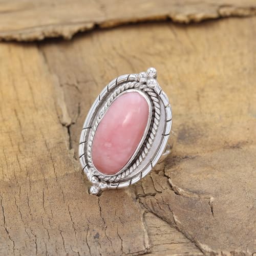 Bague opale rose : sublimez vos mains avec style