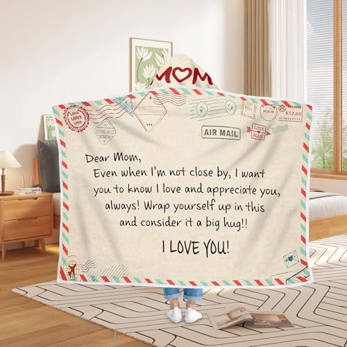 Couverture jetée maman pour des soirées cocooning confortables au salon